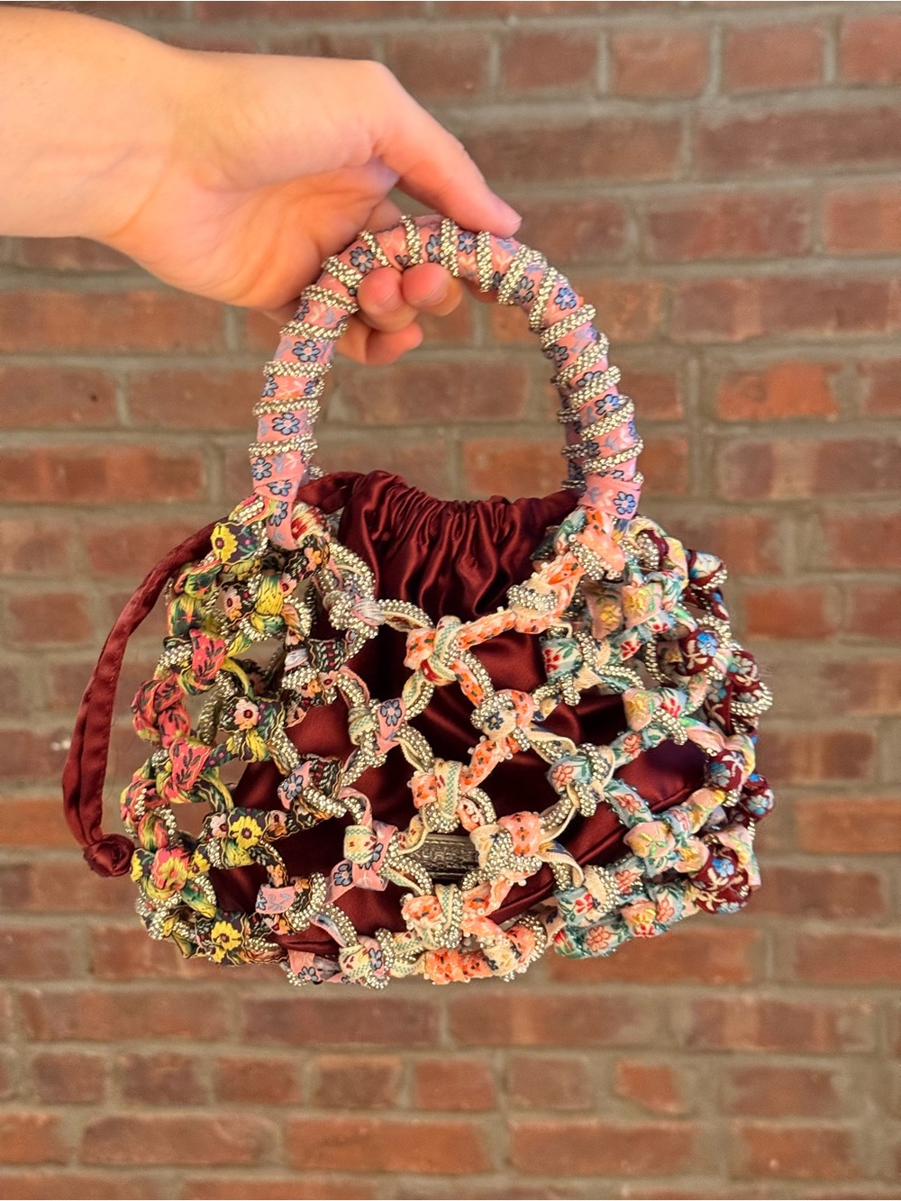 Kurt Geiger Burgundy Satin Inner Bag with Multicolor Macramé Floral Overlay